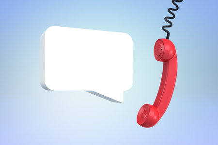 Floating phone with speech bubble on blue skyの写真素材
