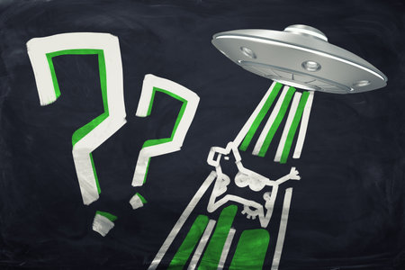 UFO abducting a cow with question marksの写真素材