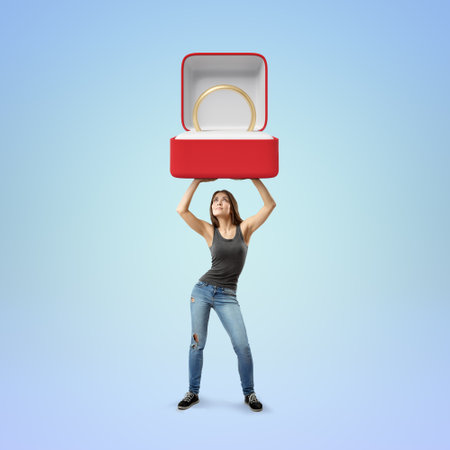 Woman holding a gigantic engagement ringの写真素材