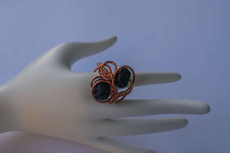 Unique handmade jewelry made of copper wire and colourful stones. Taken in the Golden City of Pforzheim, Germanyの写真素材