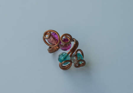 Unique handmade jewelry made of copper wire and colourful stones. Taken in the Golden City of Pforzheim, Germanyの写真素材