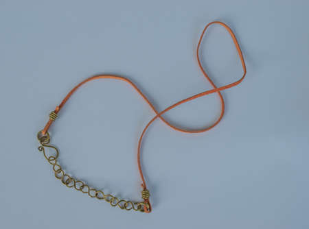 Necklace. Unique handmade jewelry made of copper and leather. Taken in the Golden City of Pforzheim, Germanyの写真素材