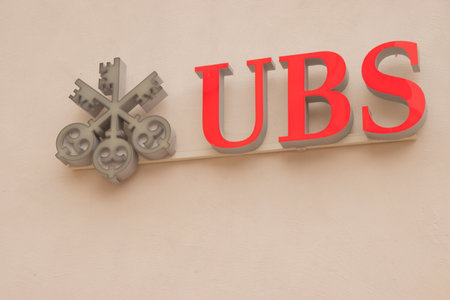 UBS Bank sign on the wall of an office in St. Moritz. The bank is a huge financial services company operating all over the world. Taken in St. Moritz / Switzerland, 10.31.2020のeditorial素材