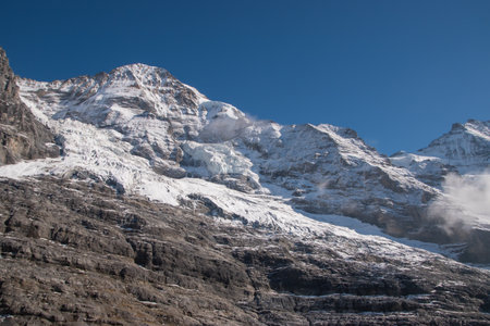Snow-capped mountains in Switzerland. Taken in Jungfrau region, Grindelwald, Switzerlandの写真素材