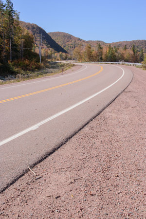 The Cabot Trail is a 298 km (185 mi) loop around the northern tip of the island, passing along and through the Cape Breton Highlands and the Cape Breton Highlands National Park.の写真素材