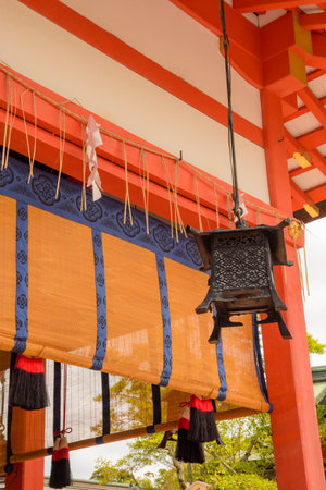 Japanese lanterns are traditional lighting devices made from materials like paper, silk, or metal, often framed with bamboo or wood. They are used for both indoor and outdoor decoration, creating a warm, ambient glow in various settings.の写真素材