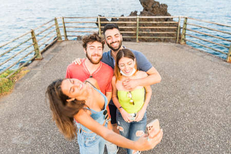 millenial friends taking selfie - Best friends taking selfie outdoor - Happy friendship concept with...