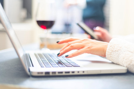 A woman using working with the laptop