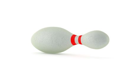 Old damaged skittle alone on whiteの写真素材