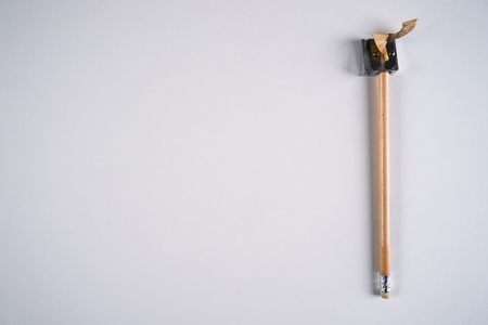 Pencil and sharpener isolated on white background.Copy space.の写真素材