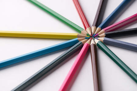 Circle of colorful pencils on white background. Close up shotの写真素材