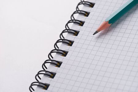 Image of pencil and notebook. Close up shotの写真素材