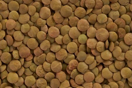 Lentil closeup top view background. Healthy protein foodの写真素材