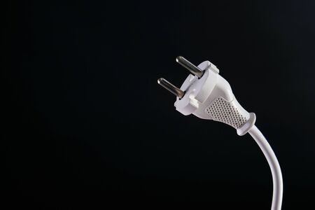 Energy, Electricity, Electric Plug on dark backgroundの写真素材