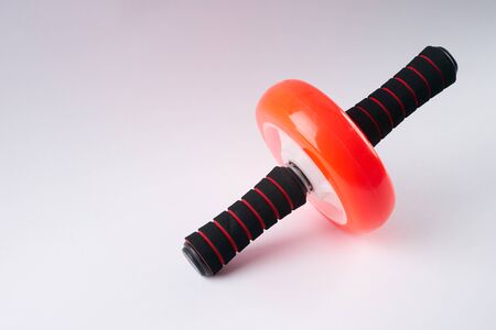 Exercise roller wheel on white background. Copy spaceの写真素材