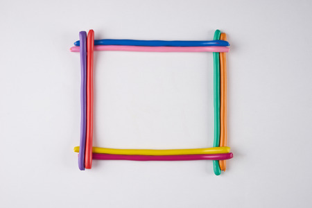 Picture frame made from color plasticine isolated on white background with copy space.の写真素材