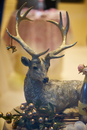Close up view of a golden deer statue.の写真素材
