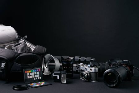 Photographer's equipment on the floor in a studioの写真素材