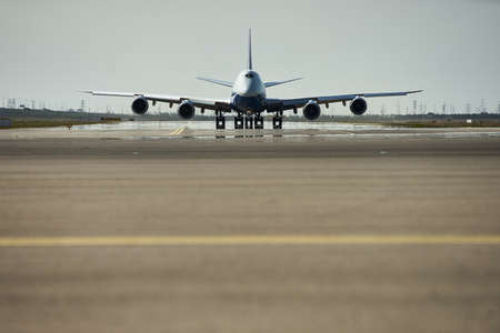 Private passenger plane taking over airport runway. Use for air transport and traveling theme.の写真素材