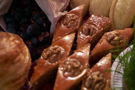 Novruz tray with Azerbaijan national desserts against silk scarf backgroundの写真素材