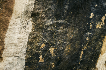 Qobustan, Azerbaijan, Baku - 22 March 2017 : Prehistorical petroglyphs at 22 March 2017 in Qobustan, Azerbaijan. Rock paintings and  Qobustan petroglyphs are listed by UNESCO as World Heritage.のeditorial素材
