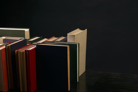 Many colorful books on shelf
