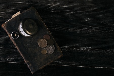 Old vintage books and a old vintage antique pocket watchの写真素材