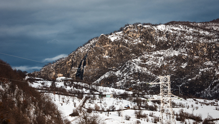 Beautiful winter landscape with cloudy blue sky