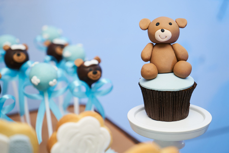 Chocolate Bear cake pops and biscuit cupcake for valentine's day. Delicious sweets snack の写真素材