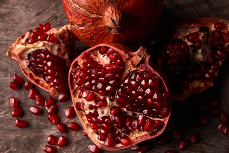 Ripe pomegranate fruit and pomegranate seeds