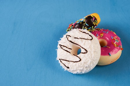 Three sweet doughnutsの写真素材