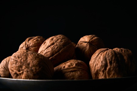 Walnuts on black backgroundの写真素材