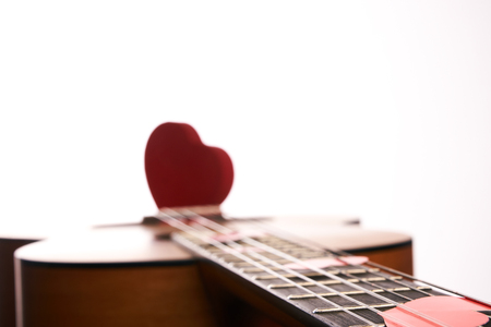 Acoustic Guitar with red heartsの写真素材
