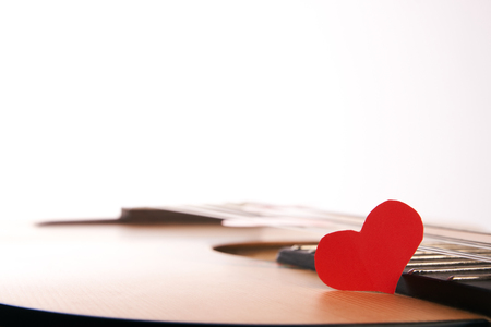 Acoustic Guitar with red heartsの写真素材