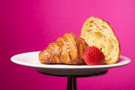 Plate of freshly baked French croissantsの写真素材