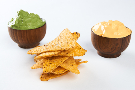 Nachos with cheese and guacamole sauceの写真素材