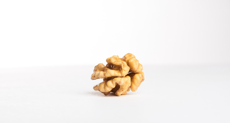 Walnuts kernel isolated on whiteの写真素材