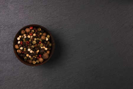 Peppercorns in Wooden bowlの写真素材