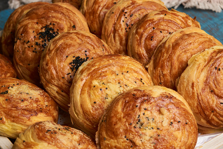 Close-up of a Azerbaijan traditional pastry gogal on rustic wooden table, novruz holidayの写真素材