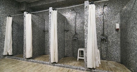 Empty Showers in modern Gym Locker Roomの写真素材