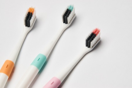 Colorful Toothbrush on white background, dental and oral care conceptの写真素材