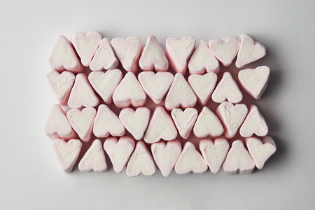 Pink heart shape from marshmallow, valentine day love beautiful background, copy space