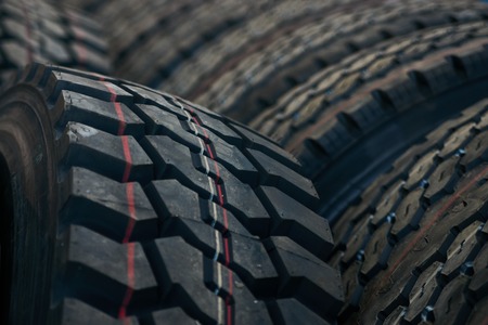 Car tires texrture background, close-up. New black tire textureの写真素材