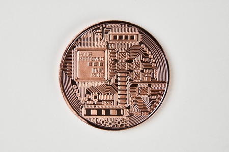 Bronze bitcoin circuit texture isolated on white background. Cryptocurrency coin, close-upの写真素材
