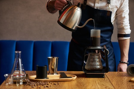 Professional barista preparing coffee alternative method, close-upの写真素材