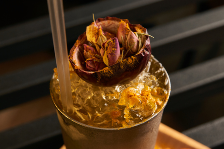 Mariachi cocktail on bar table. Freshness alcoholic beverage drink with Tequila, Luxardo, Grapefruit juice, Kurkuma syrup, Egg white ingridients, close-up.  Tart cocktail refreshing with citrus flavorの写真素材