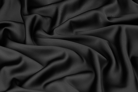 Black silk fabric background, view from above. Smooth elegant black silk or satin luxury cloth texture can use as abstract background with copy space, close-upの写真素材