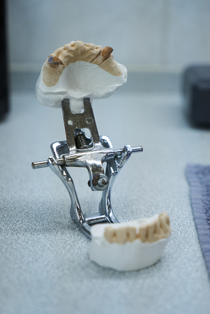 Dental equipment in dentistry laboratory office, close-up. Dental teeth, mouth, gums on dentist...