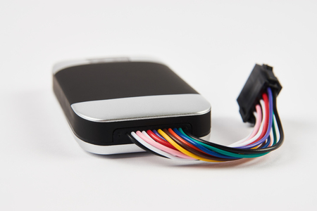 GPS tracker isolated on white. Anti-theft car security system. Car repair service conceptの写真素材