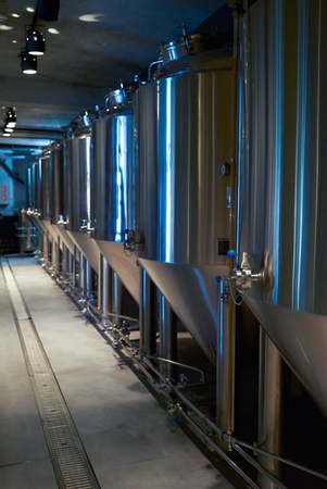 Craft beer production in private brewery. Beer Preparation Brewery Equipment, close-up.の写真素材